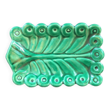 Stylized leaf pocket emptier