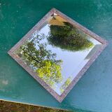 Art Deco mirror in chiseled wrought iron with beveled glass