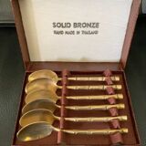Small solid bronze spoons