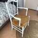 Fauteuil blanc assise paillée