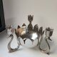 Candle holder in silver-plated metal, lotus shape.