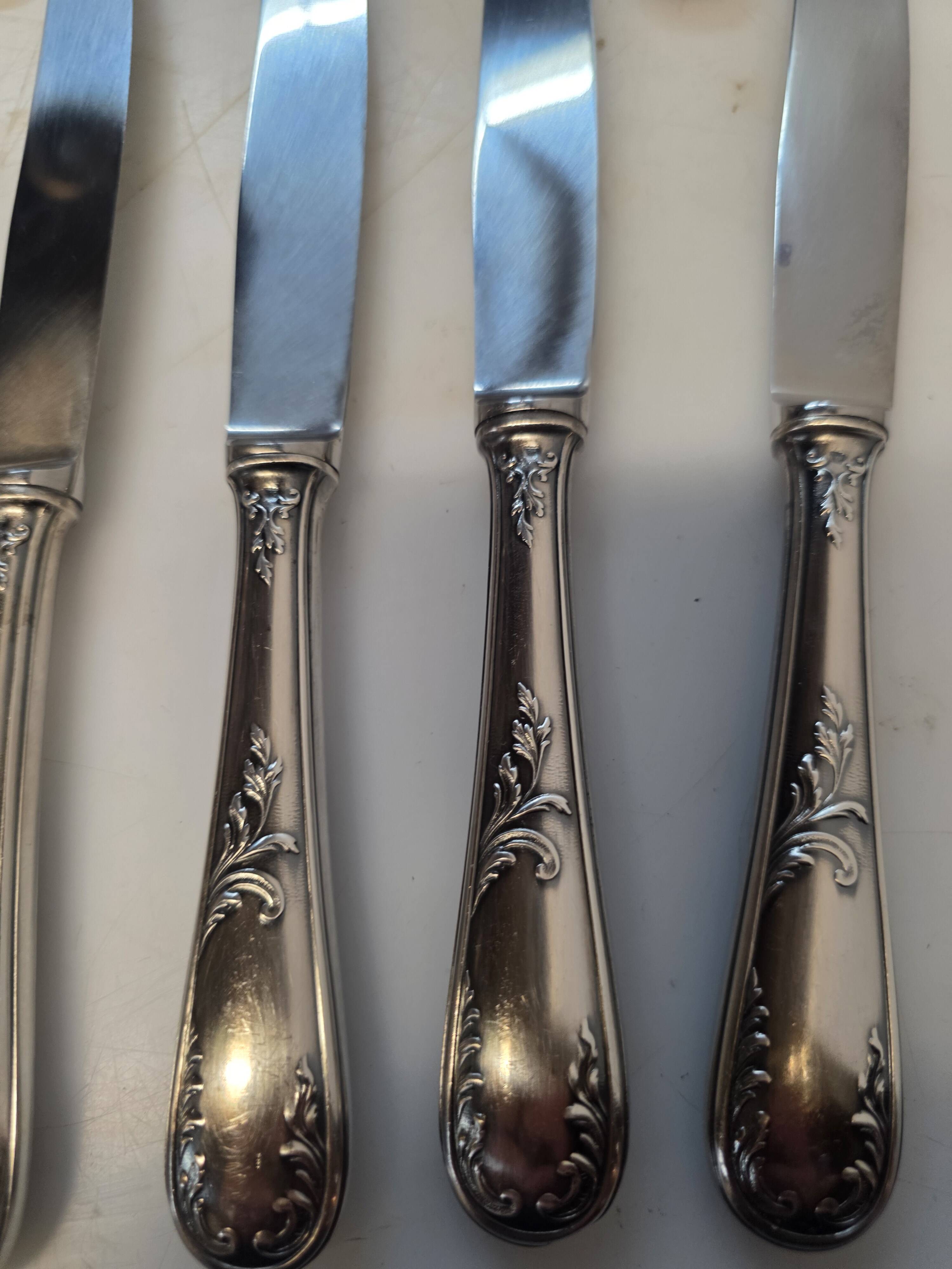 12 silver-plated knives