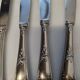 12 silver-plated knives
