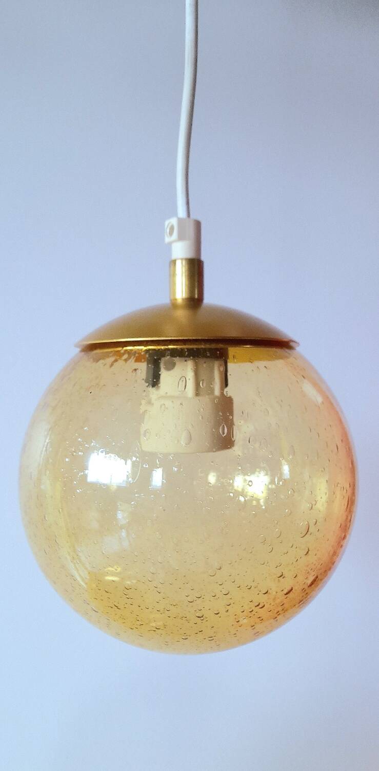 Set of 2 bubbled amber glass globe pendants