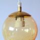 Set of 2 bubbled amber glass globe pendants