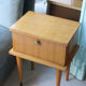 Modernist bedside table from the 1950s with compass legs.