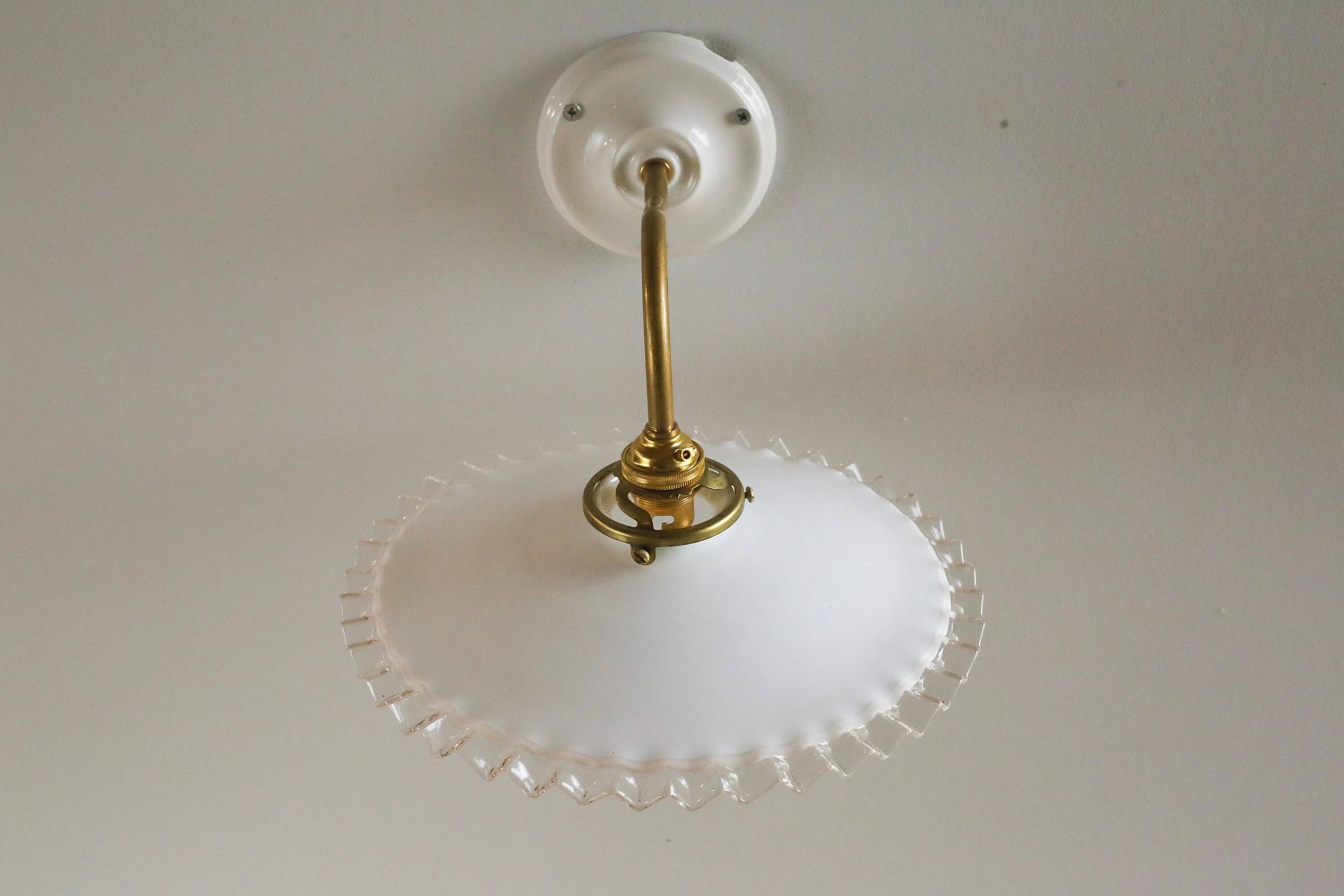 Wall light in white opaline glass, with ceramic and brass support