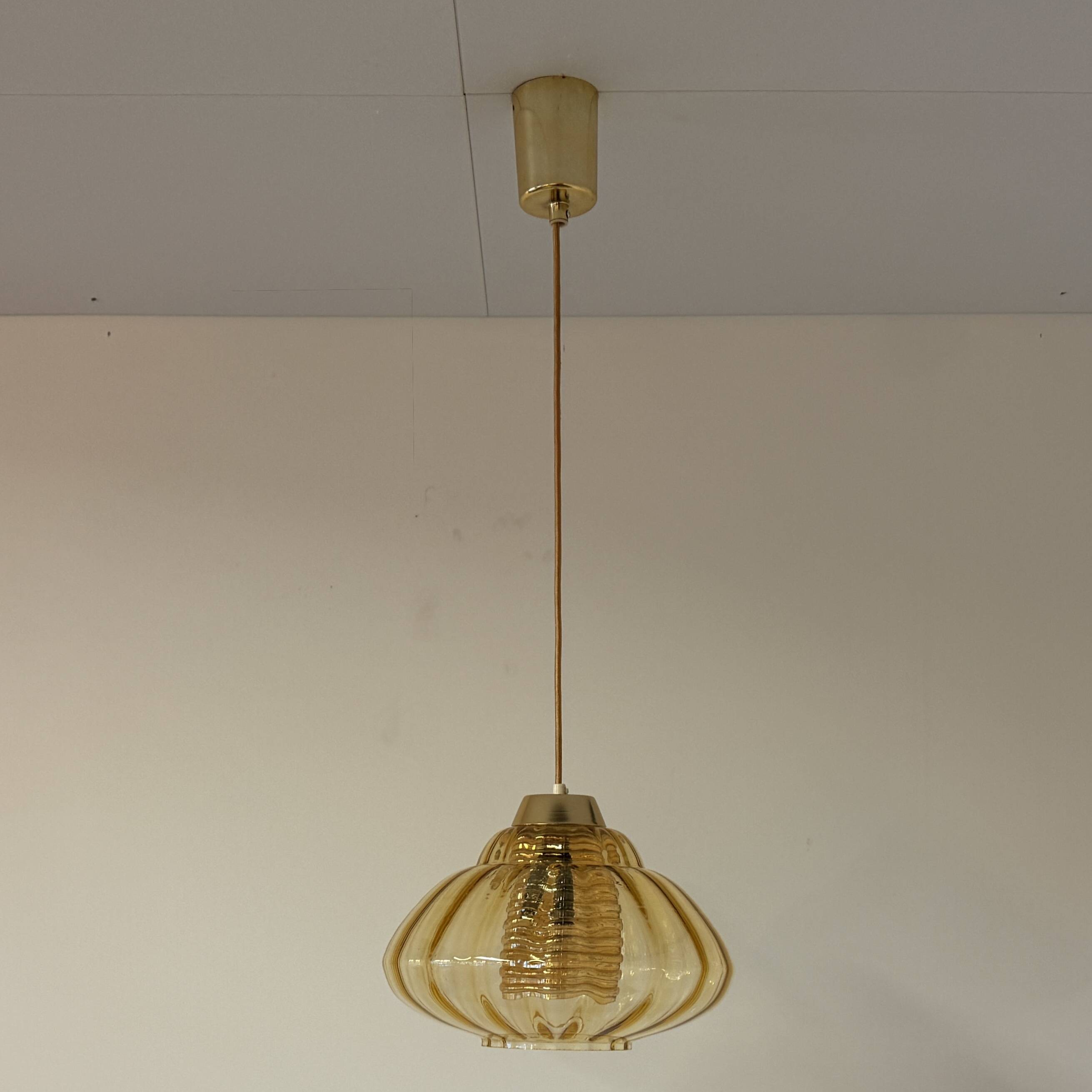 Vintage pendant lamp with amber glass shade