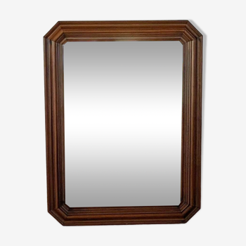 Octagonal wooden mirror.