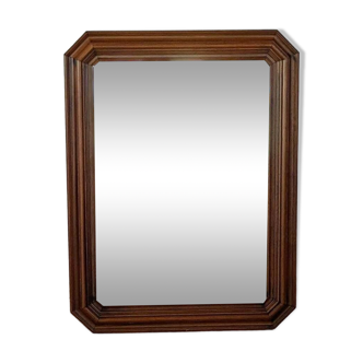 Octagonal wooden mirror.