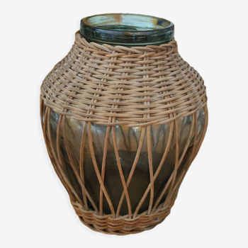 Glass jar surrounded by wicker