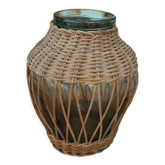 Glass jar surrounded by wicker