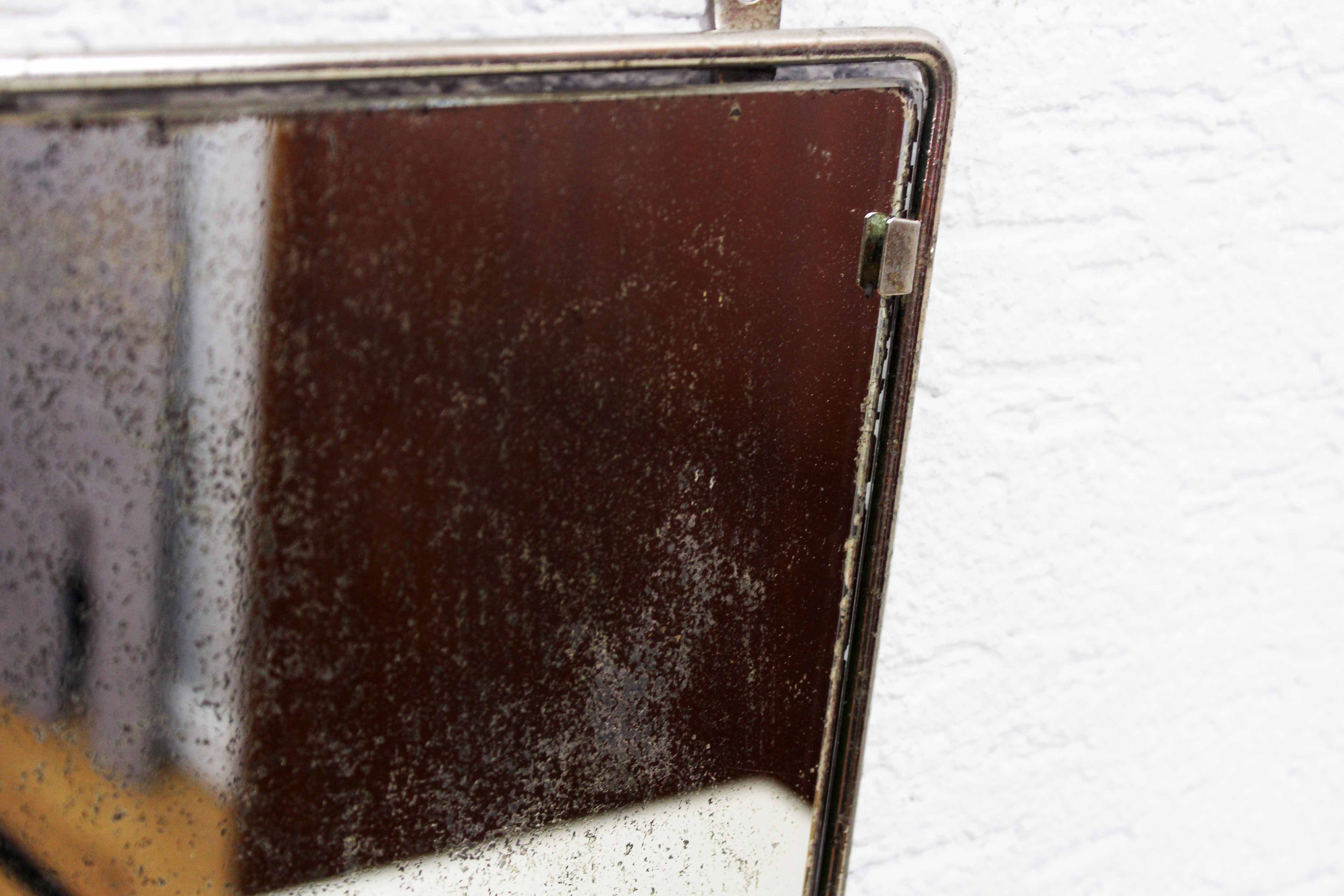 Wall-mounted barber mirror