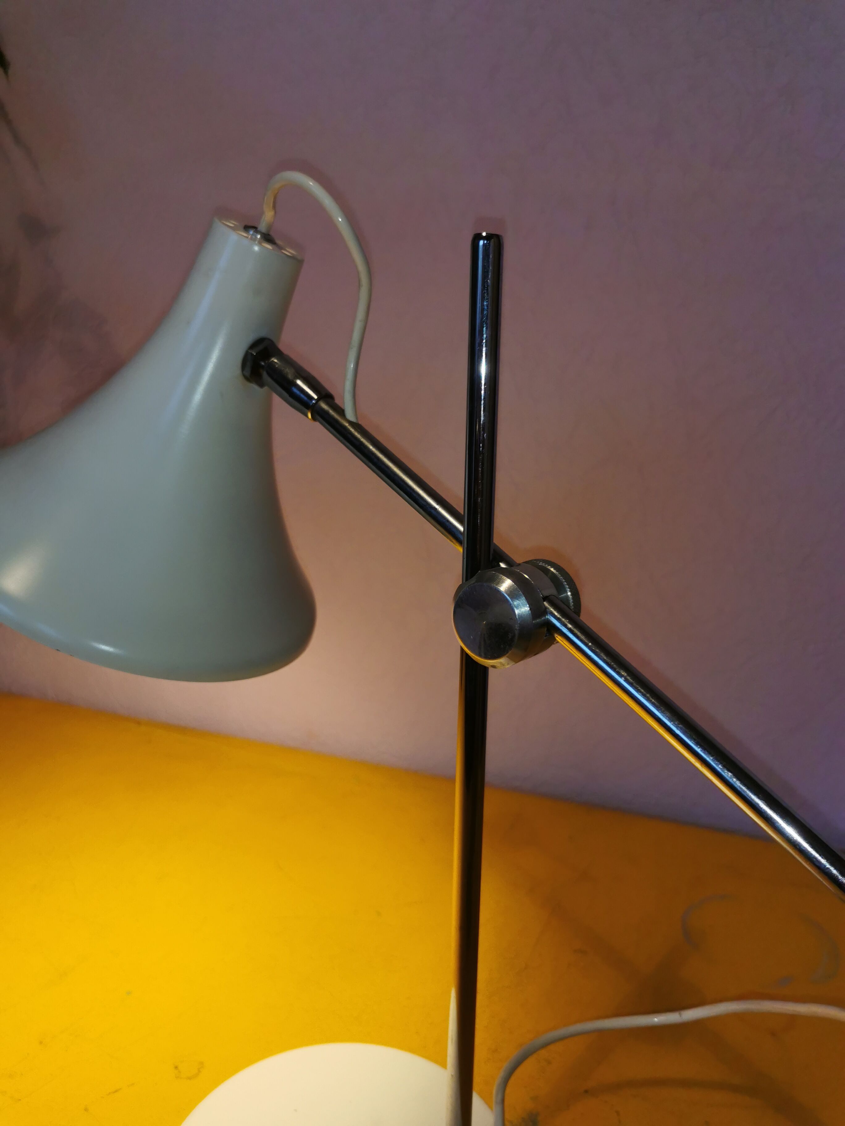 Articulated lamp in white lacquered steel and chrome, 1970.