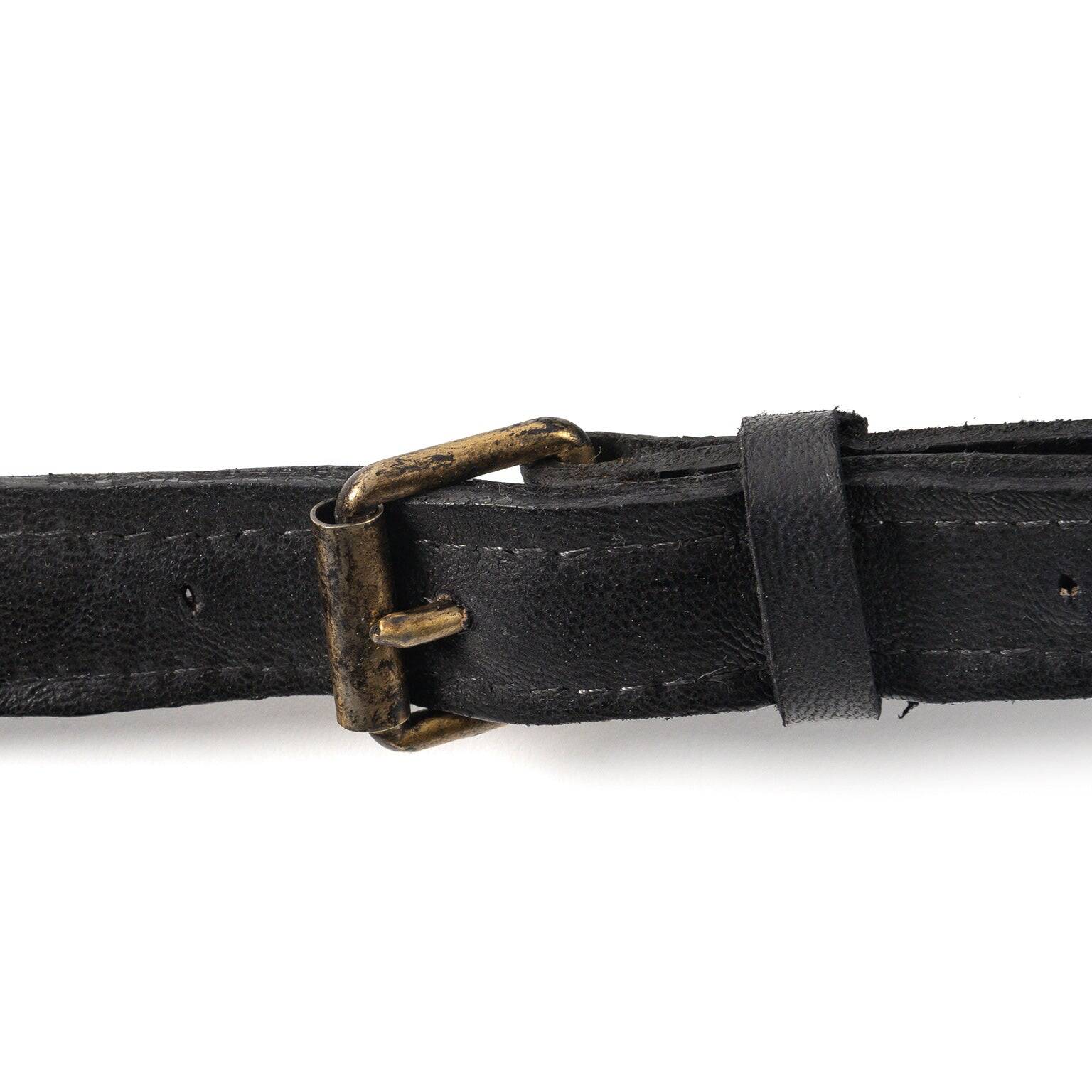 Leather strap mirror attributed to Jacques Adnet, France, 1950s.