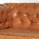 Sheepskin 2.5-seater Chesterfield sofa in a light cognac colour