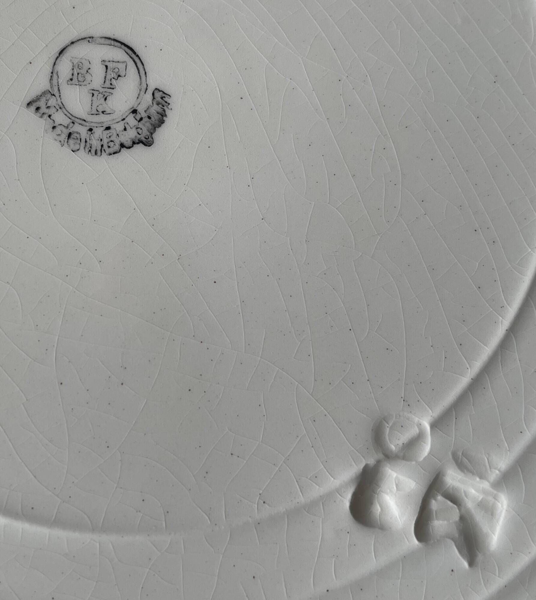 6 large antique flat plates in B.F.K. earthenware.