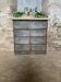 Furniture with 8 metal and wood flaps.