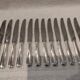 12 silver-plated table knives by Ercuis, Senlis pattern, 24.7cm