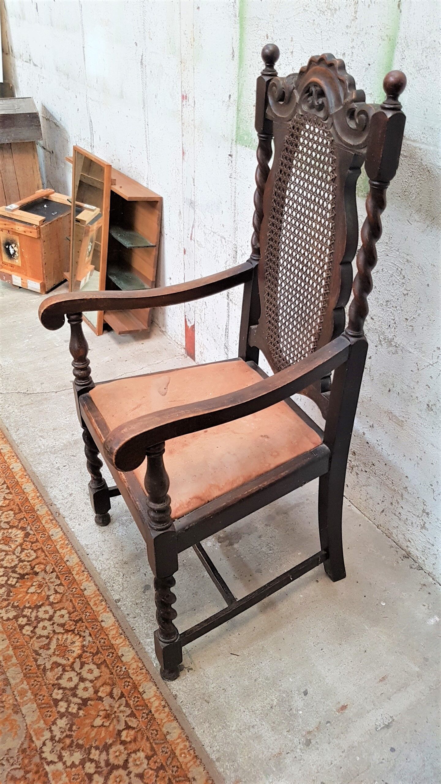 Solid oak and leather armchair