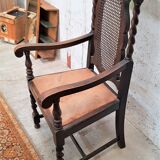 Solid oak and leather armchair