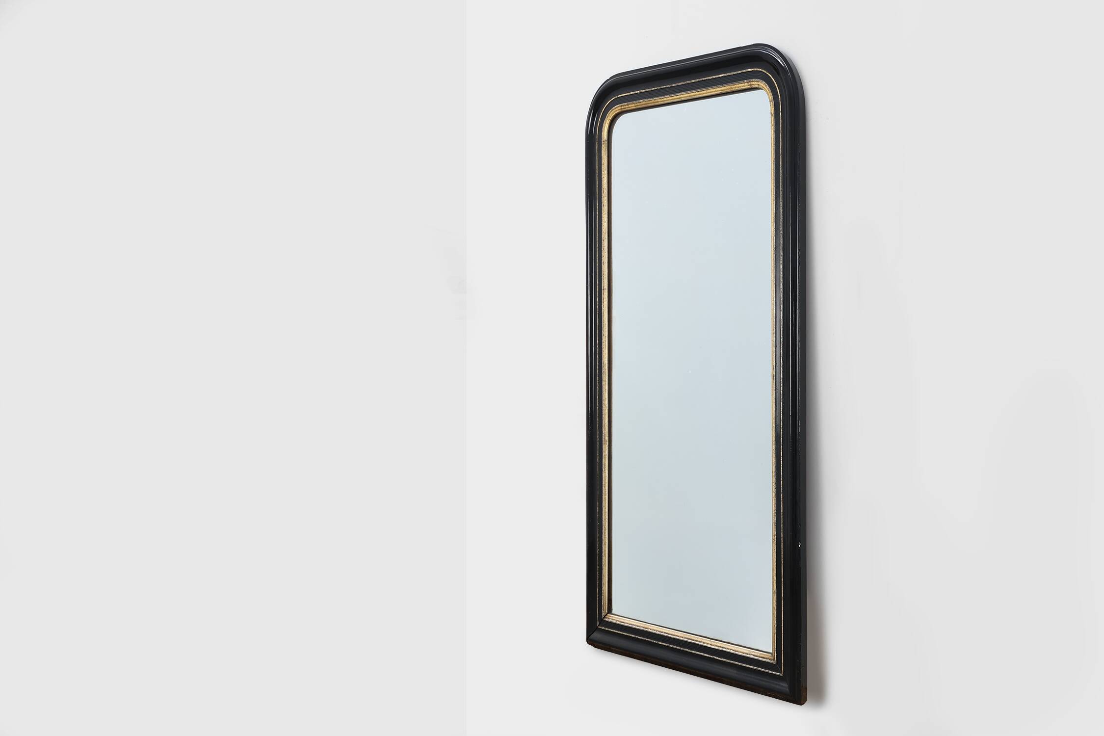 Black laquered and gilted wooden Louis Philippe mirror, France ca. 1850