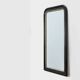 Black laquered and gilted wooden Louis Philippe mirror, France ca. 1850