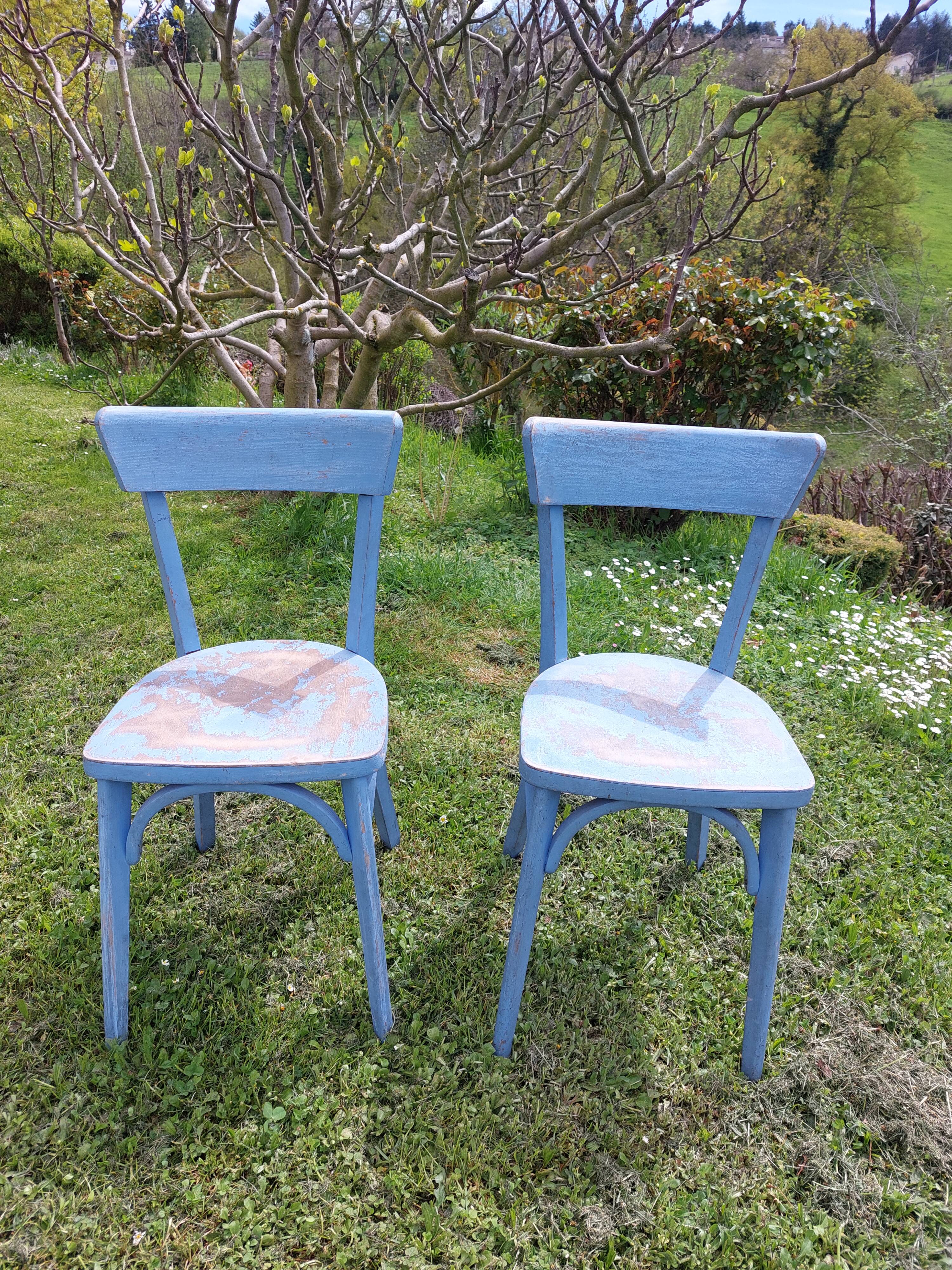 pair of chippy blue paint bistro chairs