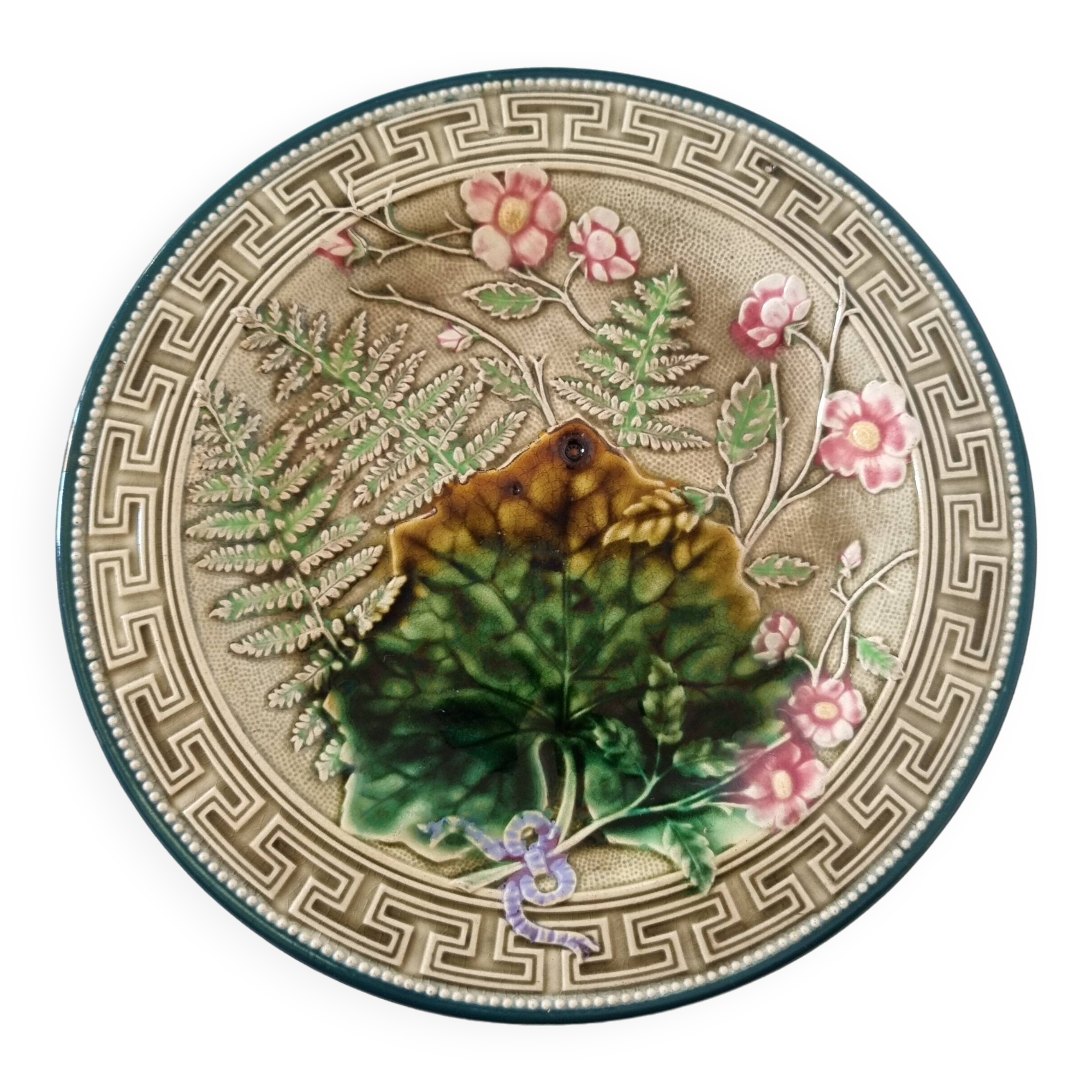 Choisy Le Roi majolica or barbotine dish decorated with leaves and pink flowers from the 19th century