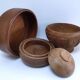 Four vintage solid wood cups