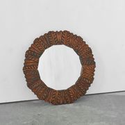 Mid-century mirror in carved wood from the 1960s.