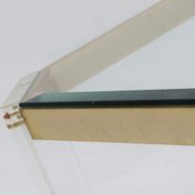 Table basse française en acrylique et verre plaqué or 1970s