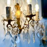 Pair of bronze wall lights and crystal pendants