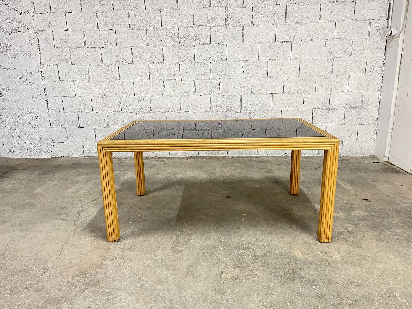 Italian rattan and glass table from the 1970s