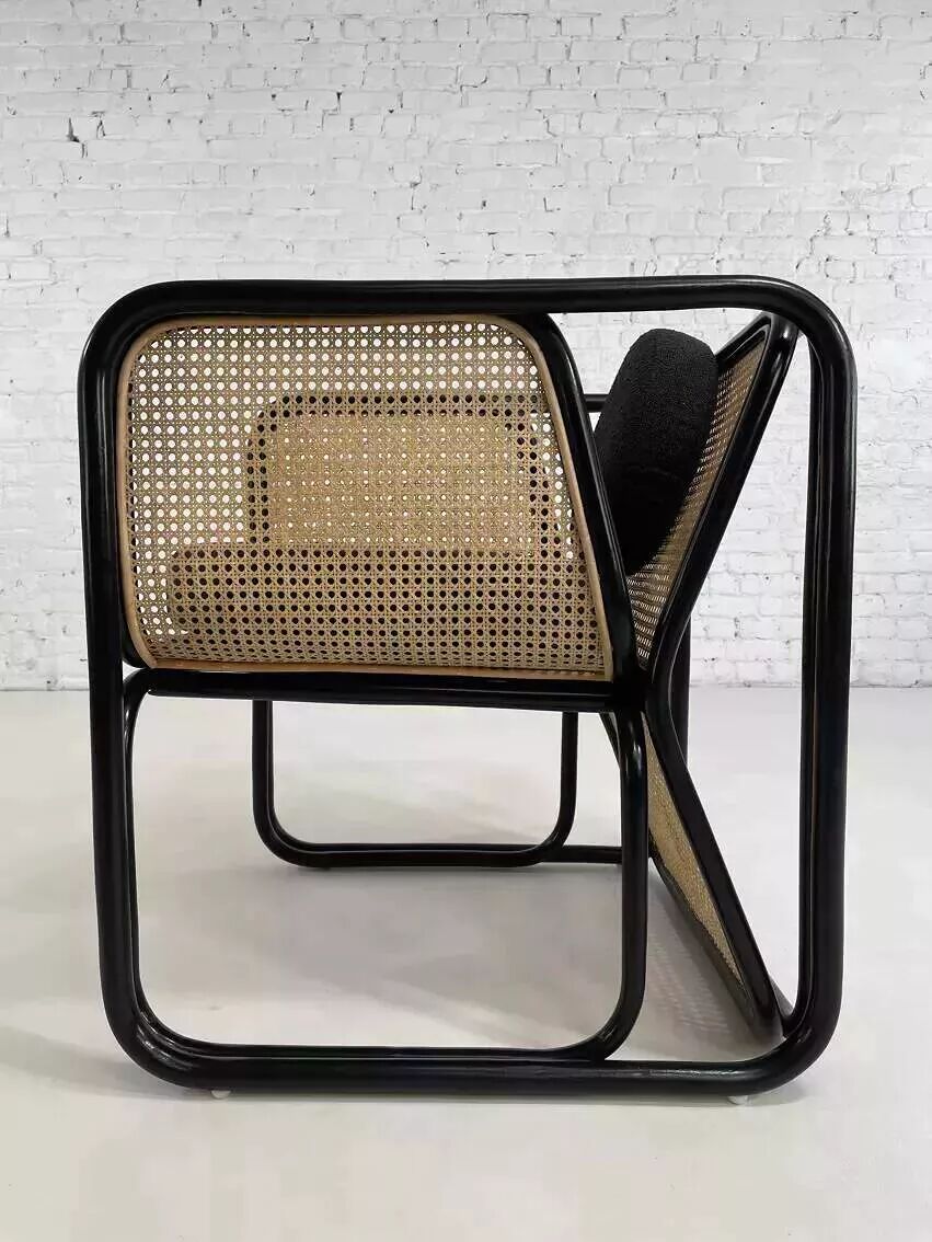 Cubic armchair in black rattan and canework