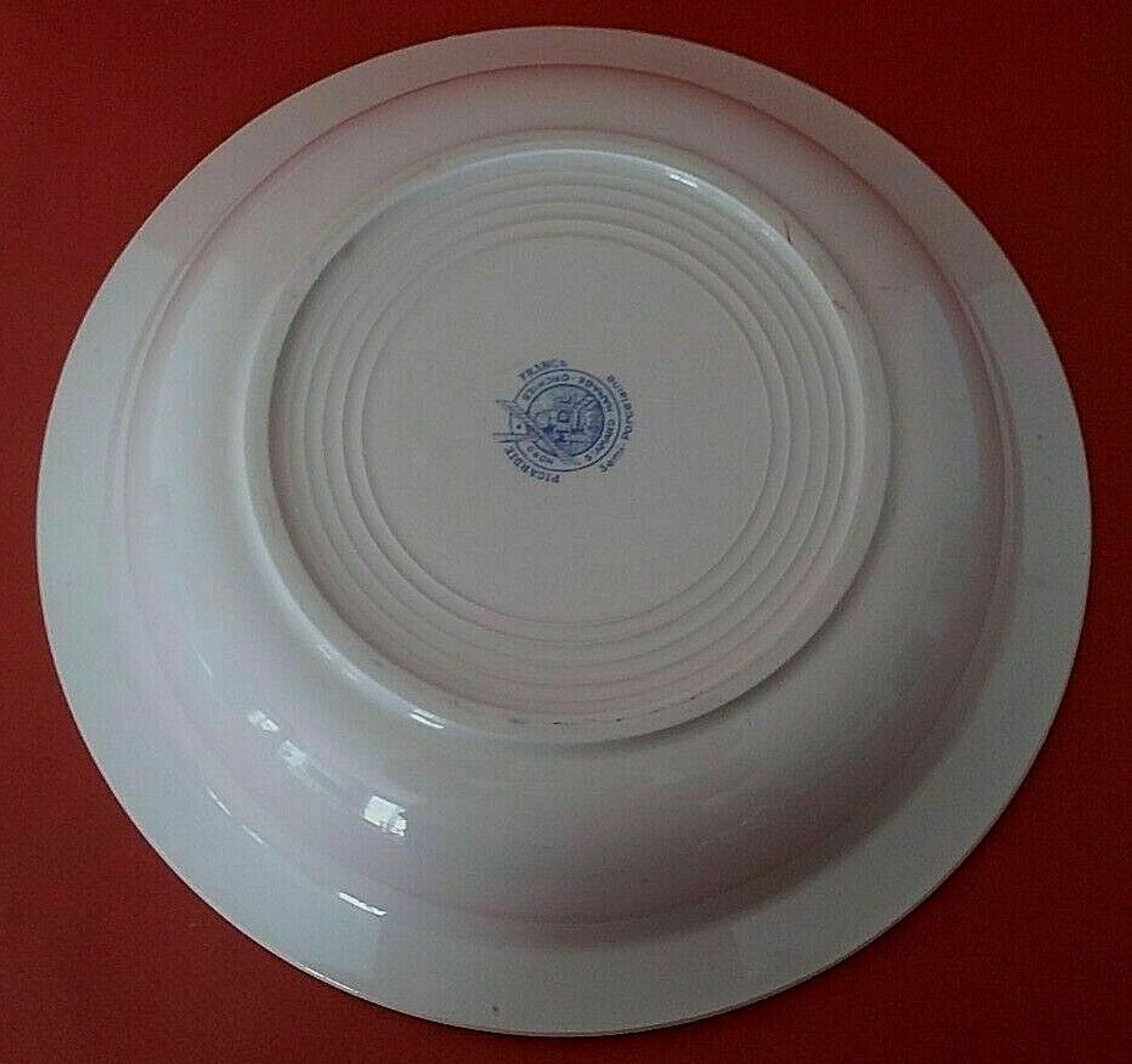 Hollow earthenware dish Saint Amand early twentieth floral decoration