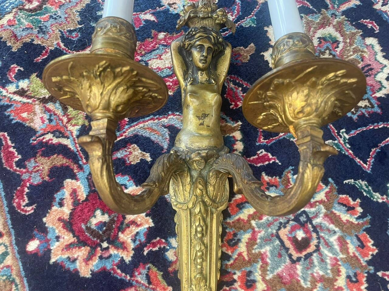 Pair of gilt bronze wall sconces with caryatid and Atlante decoration, 18th century.