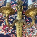 Pair of gilt bronze wall sconces with caryatid and Atlante decoration, 18th century.
