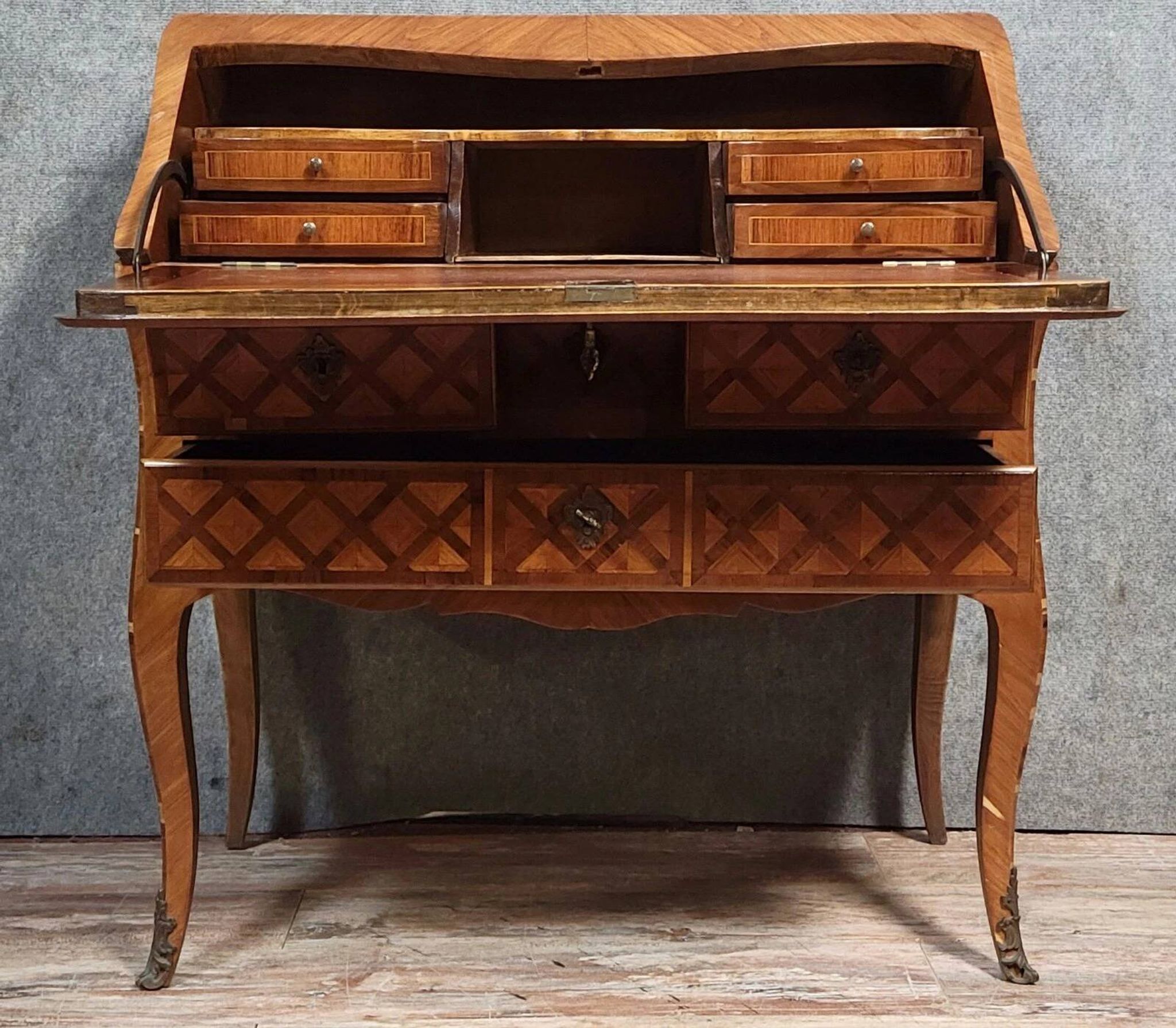 Louis XV period curved secretary desk in marquetry, circa 1750