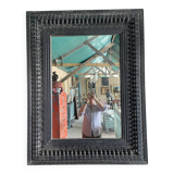 Black carved wooden mirror