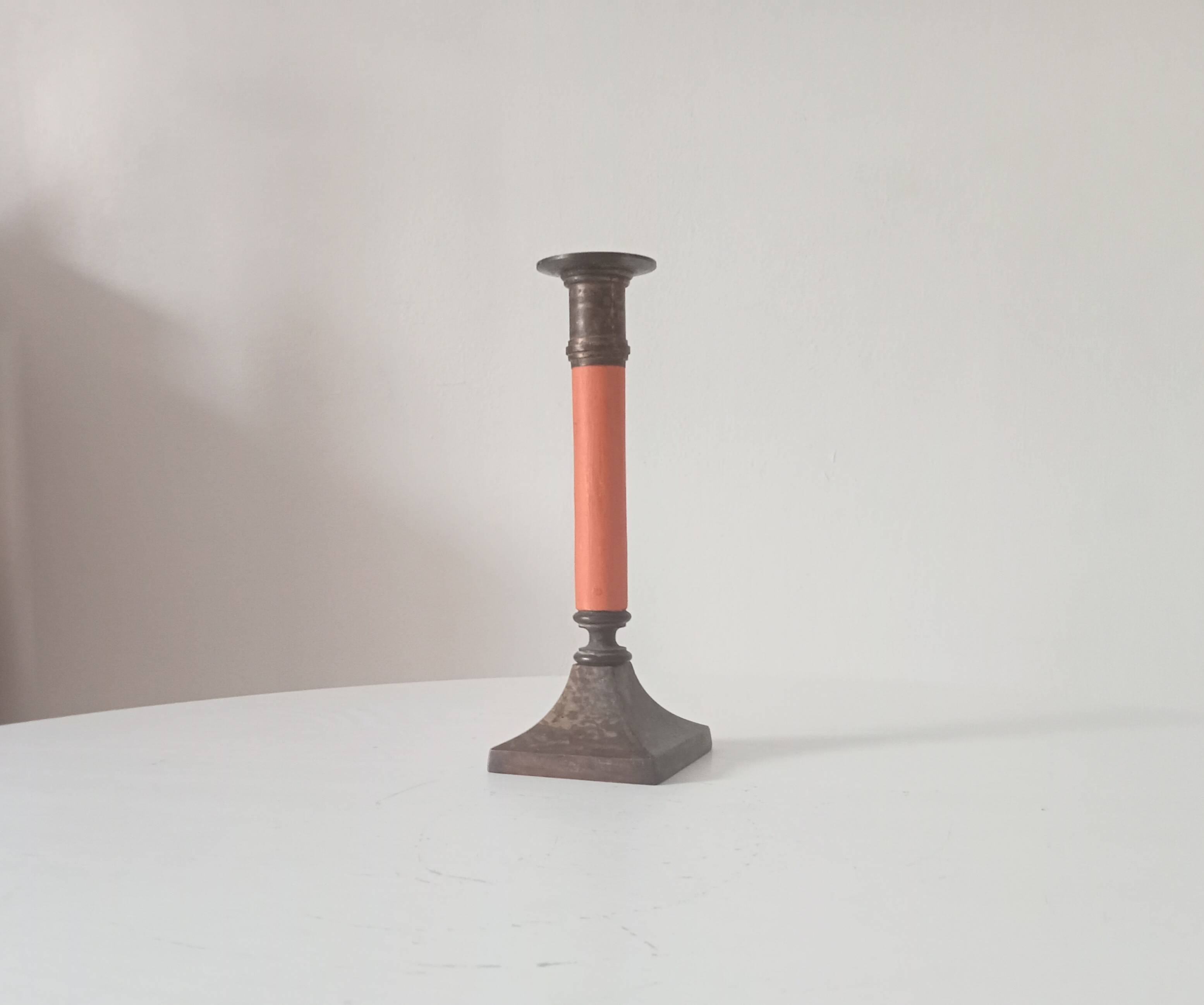 Vintage candlestick in solid gilded brass and orange wood.