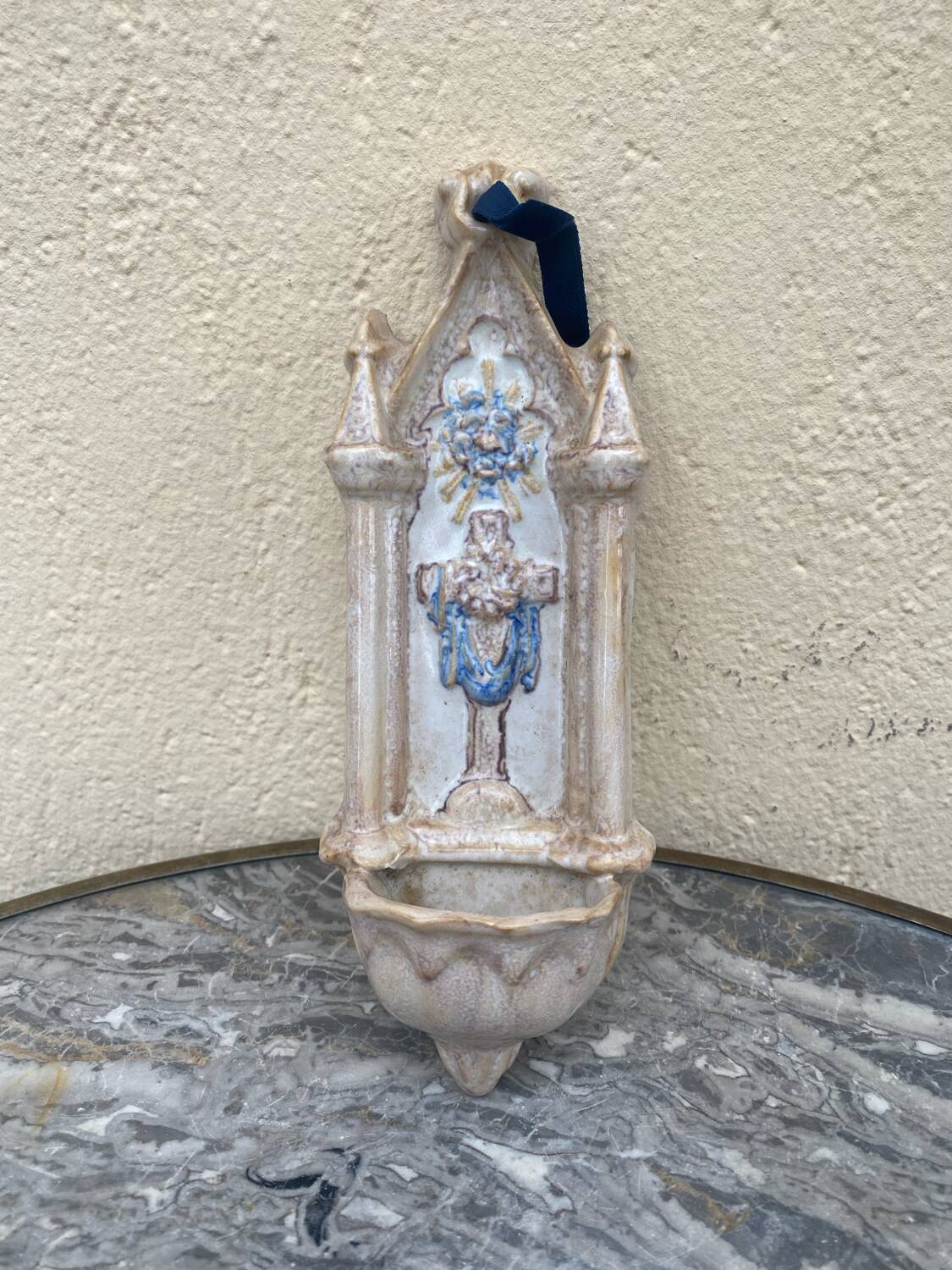 Antique holy water font in polychrome enamelled earthenware signed