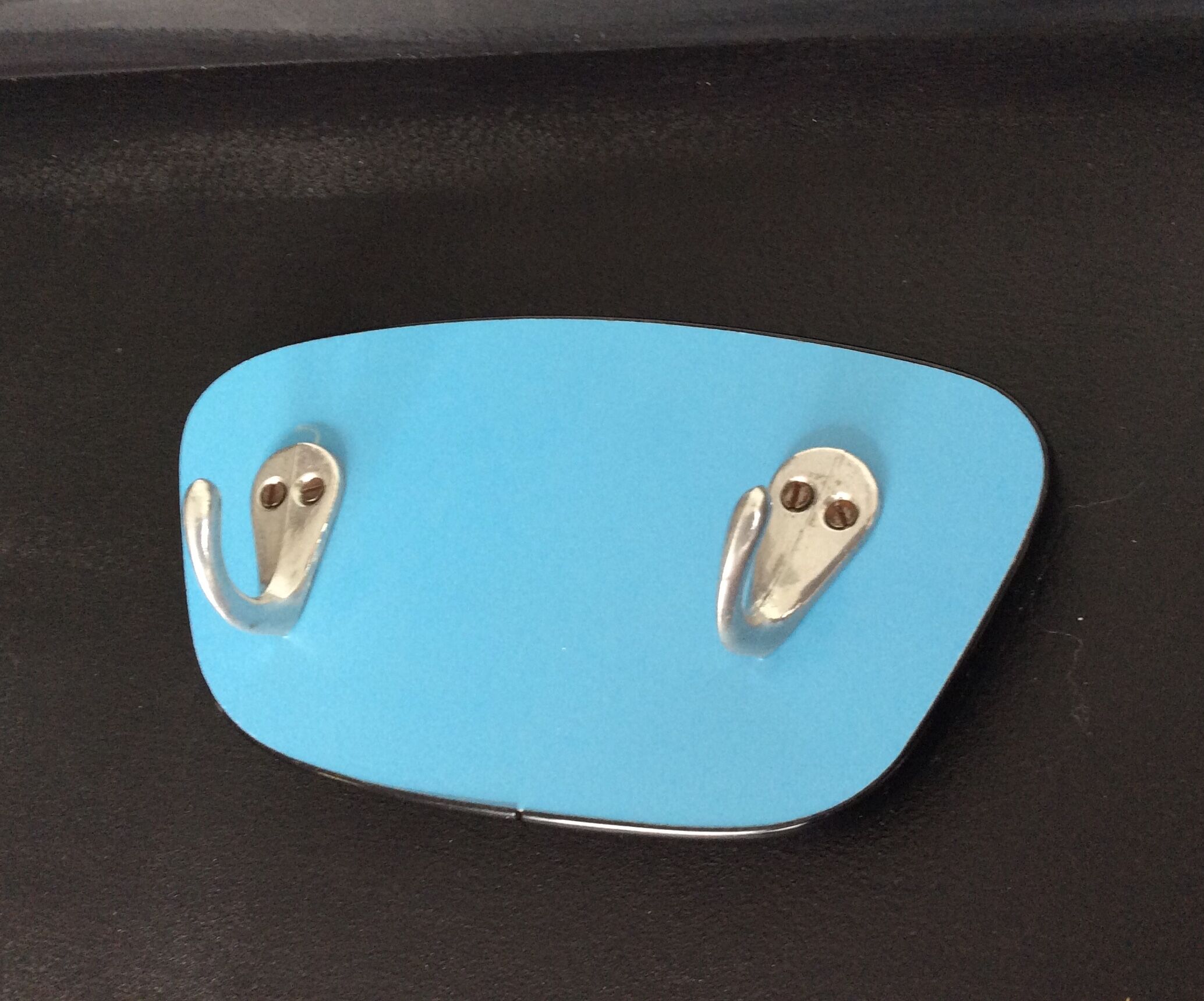 Asymmetrical coat rack in blue formica 60/70