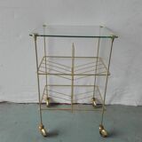 Brass and glass magazine door