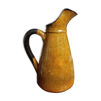 Enamelled terracotta jug