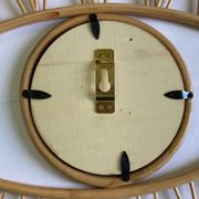 Rattan eye mirror