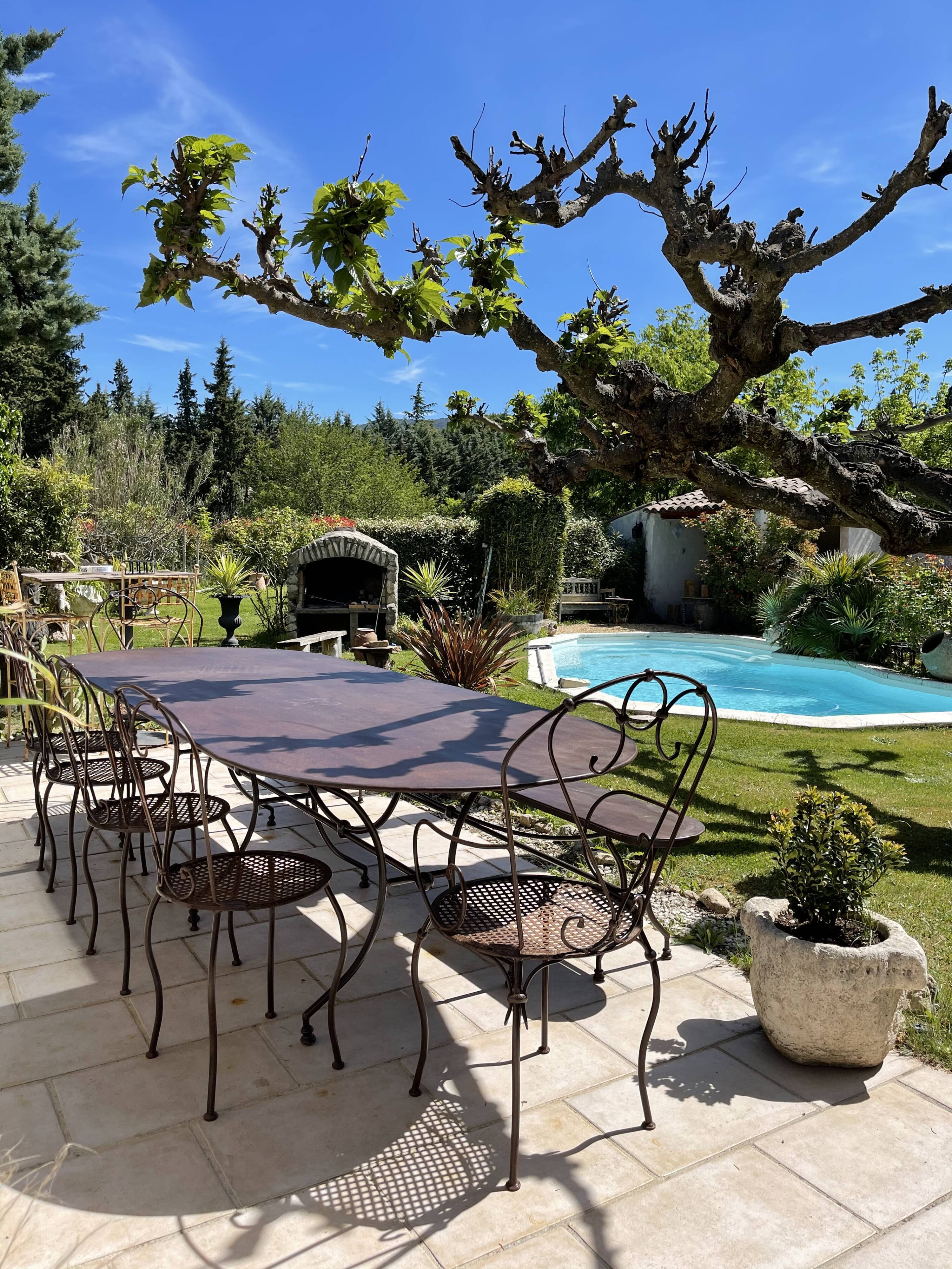 Artisanal wrought iron garden table