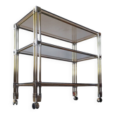 Dessert, vintage gold rolling bar, chrome and smoked glass.
