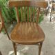 pair of dark bistro chairs, rounded backs, Baumann style