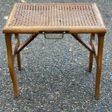 Solid wood folding stool with caned seat